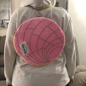 Concha shaped backpack/shoulder bag.